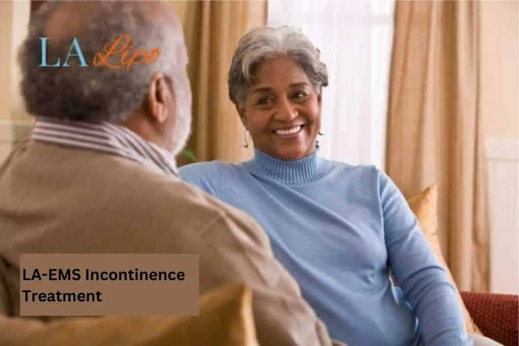 Couple sat smiling at each other - LA-EMS treatment Hale End