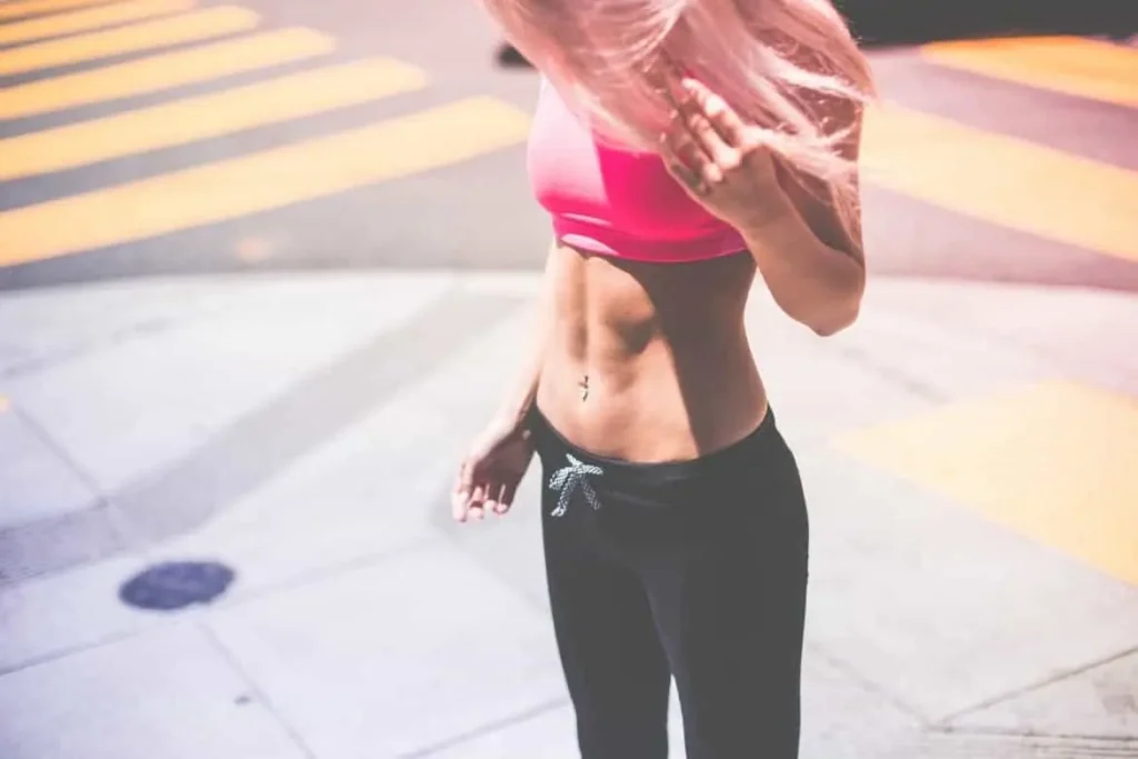 Woman with toned stomach after LA-EMS Body Sculpting Treatment Hale End