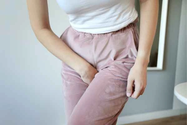 woman running for the toilet because of urinary incontinence Hale End